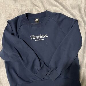 New Balance womens Timeless Blue Crewneck Sweater